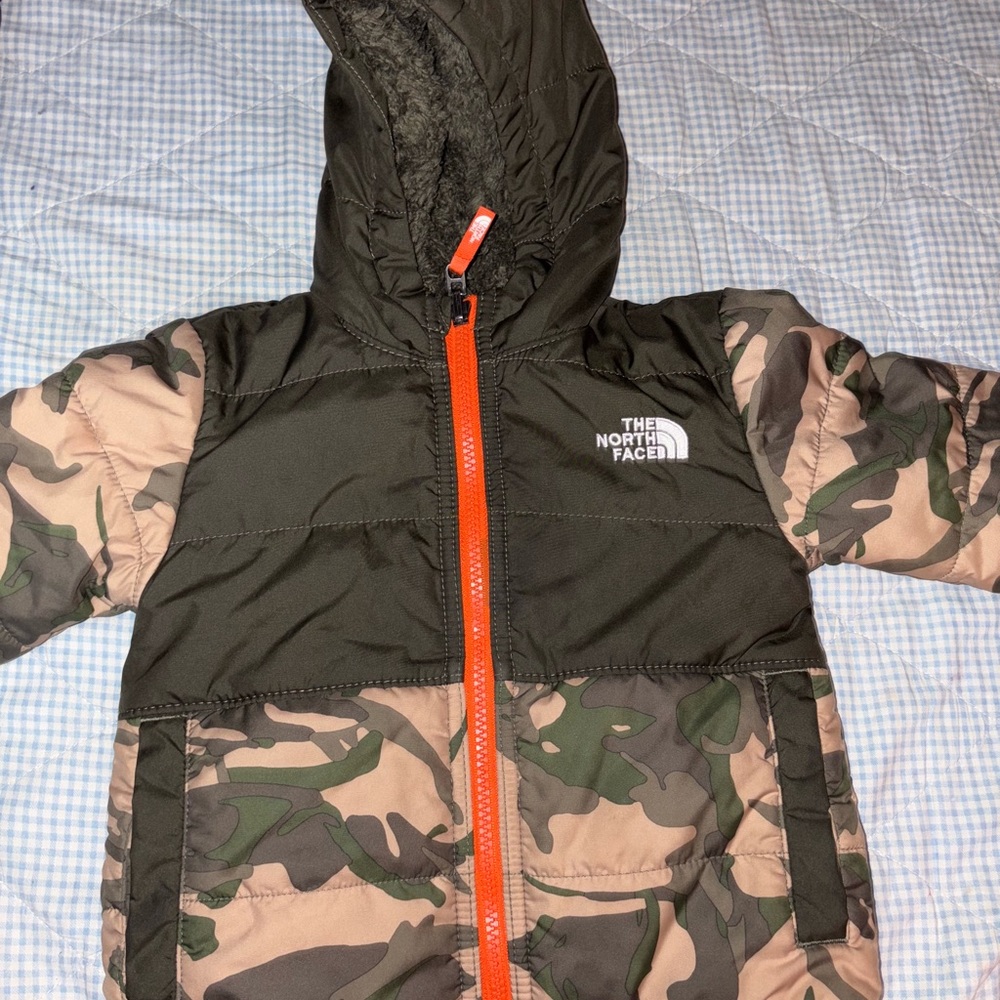 The North Face Green Camouflage Jacket with Bright Orange Zipper